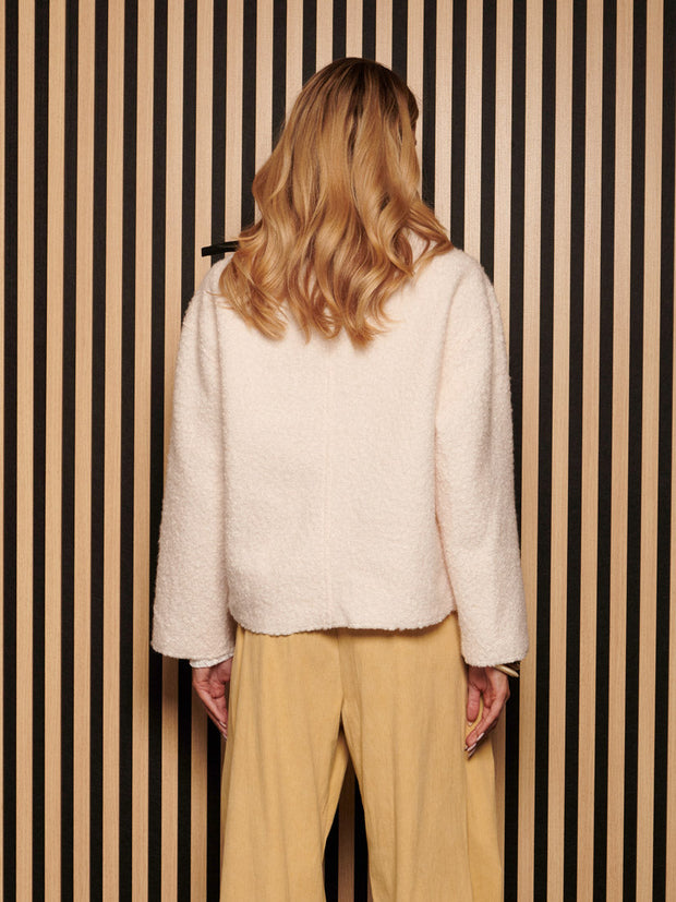 <b> Ghospell </b> Naya Tie Jumper